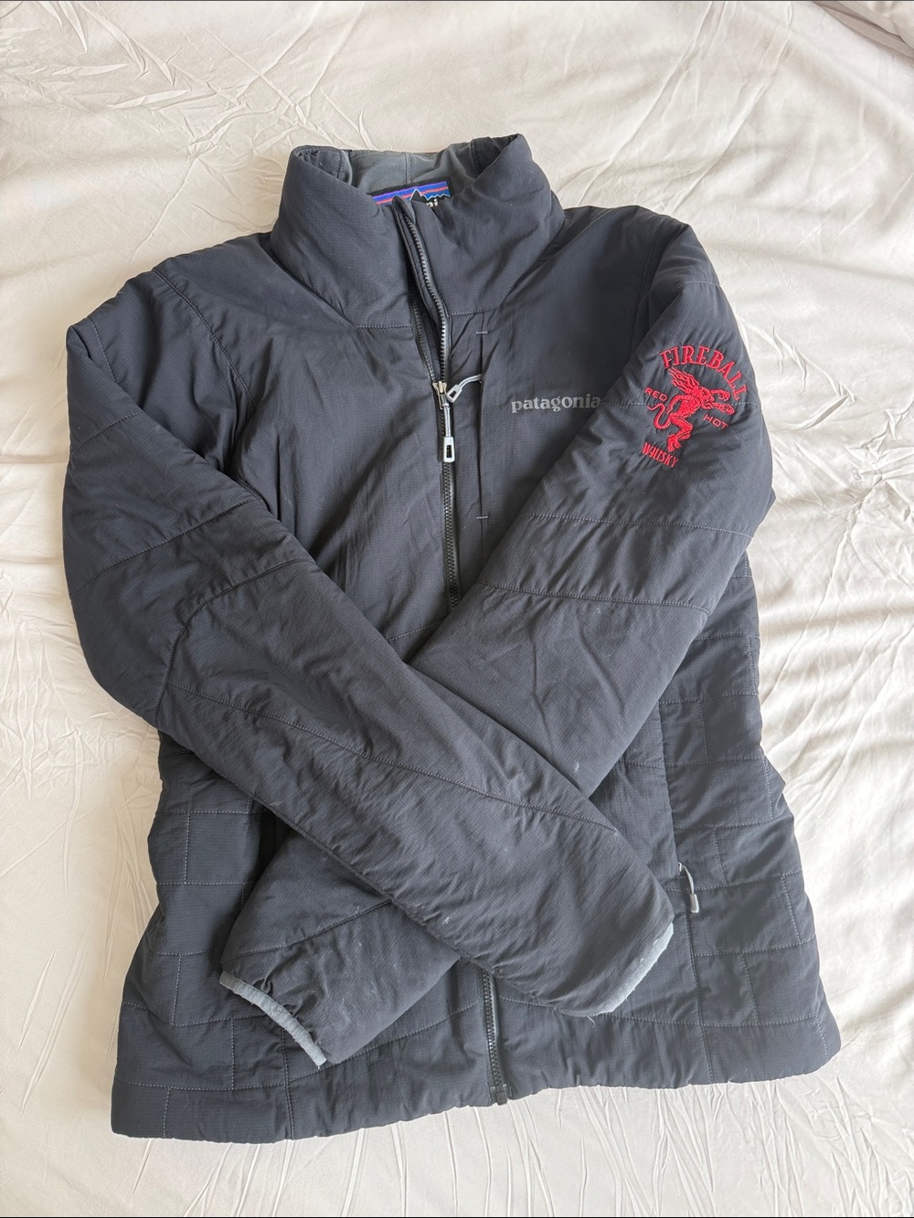 Patagonia Black Puffer Jacket with Fireball Logo Sleeve Emblem